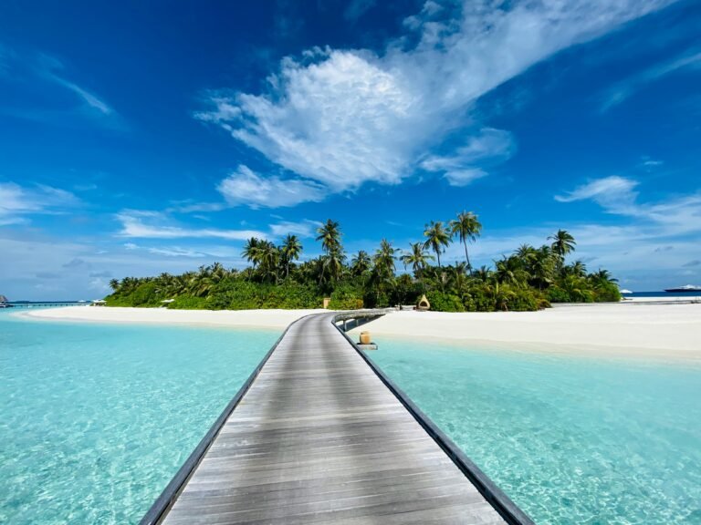 Small beach island surrounded by calm blue water, symbolizing how daily goal-writing makes ADHD goals feel clear, safe, and achievable.